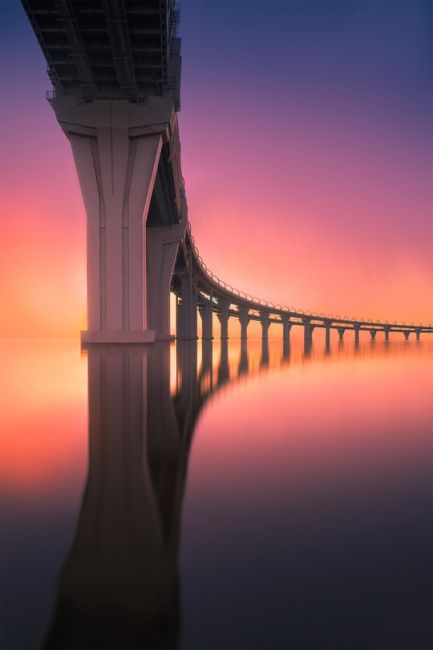 Петербуржец сфотографировал закат на Канонерском острове в эстетике ретровейва.  Фото: Максим..